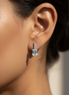The Solitaire Cascade: Emerald Cut Silver Dangle Earrings