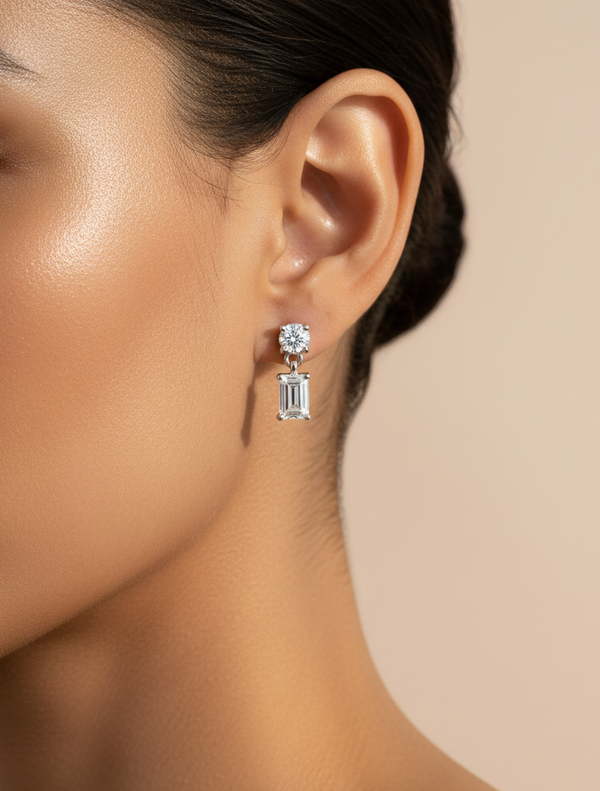 The Crystal Cascade: Silver Rhodium Drop Earrings with Emerald Cut Stone